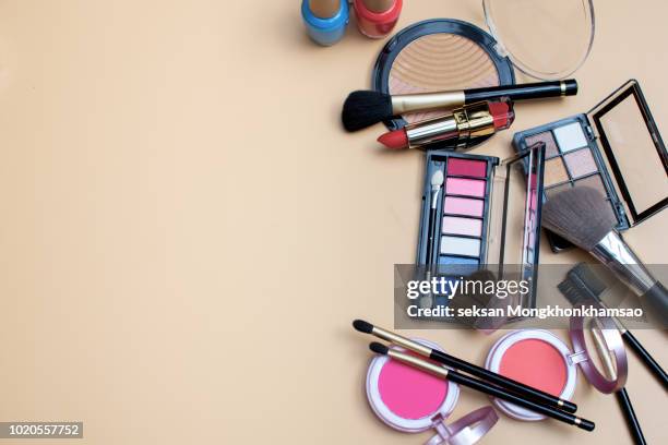 set of decorative cosmetics on light colorful background - make up table stock pictures, royalty-free photos & images