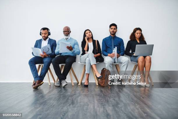 the top achievers in one room - candidate interview stock pictures, royalty-free photos & images