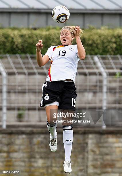 Kim Kulig of Germany jumps during the DFB women's U20 match between Germany and USA at the Ludwig-Jahn-Stadion on June 13 2010 in Herford, Gerrmany.