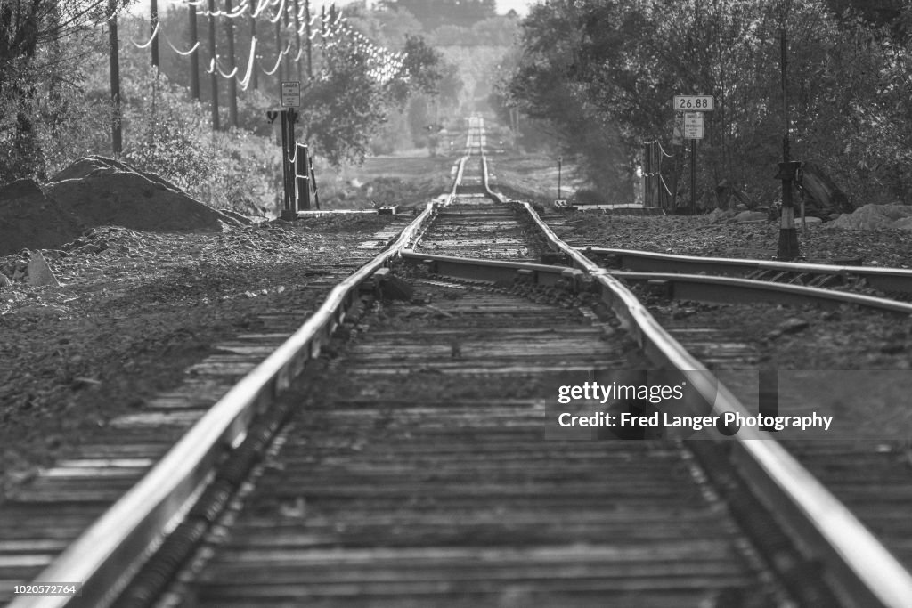 Train Tracks Leaving Town Perspective High-Res Stock Photo Getty