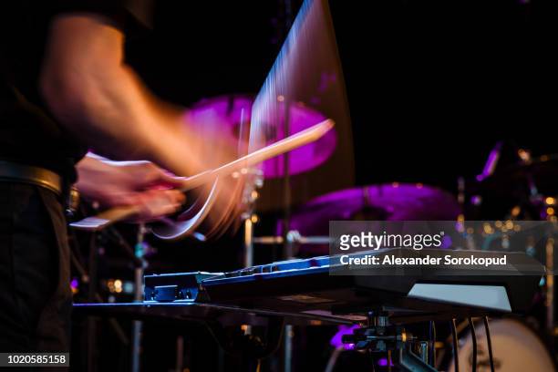 drummer playing rock music on concert - blues stock-fotos und bilder