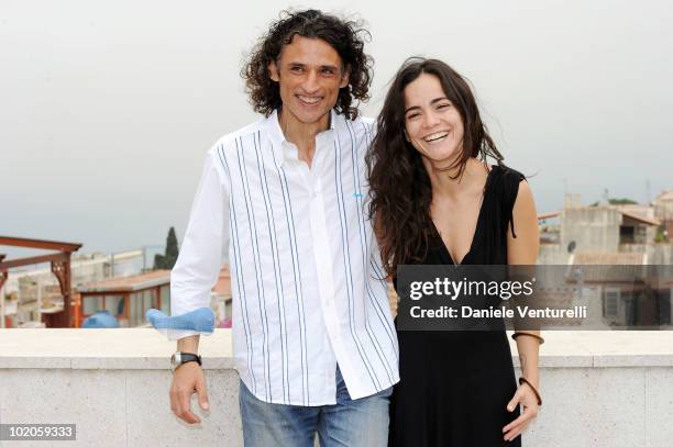 Enrico Lo Verso and Sonia Braga attend the Taormina Film Fest 2010 Photocall on June 14, 2010 in Taormina, Italy.