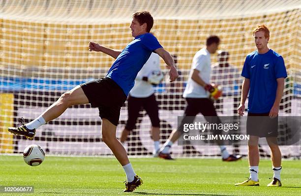 New Zealand defender Andrew Boyens and Aaron Clapham take part in training session at the Rotal Bafokeng Stadium in Rustenburg on June 14, 2010 ahead...