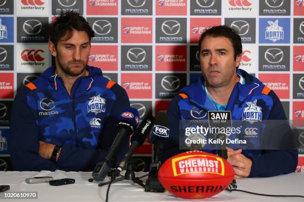 Jarrad Waite of the North Melbourne Kangaroos and Brad Scott head coach of North Melbourne speak to the media during a press conference at Arden...