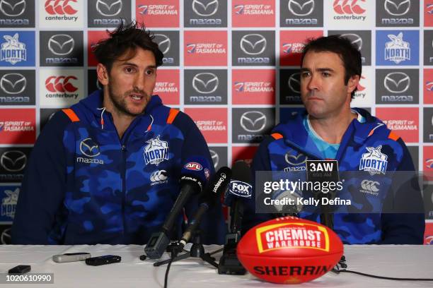 Jarrad Waite of the North Melbourne Kangaroos and Brad Scott head coach of North Melbourne speak to the media during a press conference at Arden...