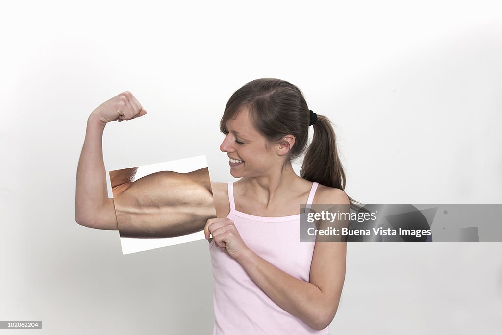 Woman flexing muscles