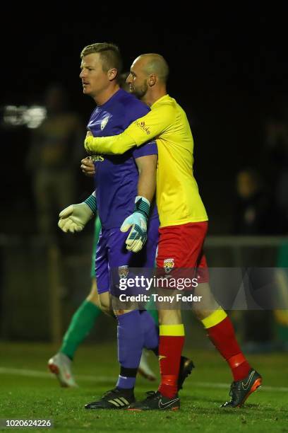 Paul Bitz of Broadmeadow is congratulated by team mates after saving the ball during the FFA Cup round of 16 match between Broadmeadow Magic and...