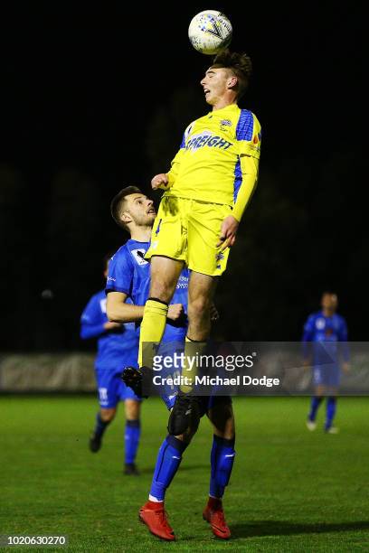 Edward BIDWELL of Devonport heads the ball Kaine SHEPPARD of Avondale during the FFA Cup round of 16 match between Avondale FC and Devonport Strikers...