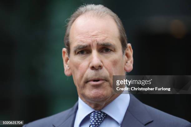 Sir Norman Bettison gives a statement after he was granted a stay of proceedings during a hearing at Preston Crown Court on August 21, 2018 in...