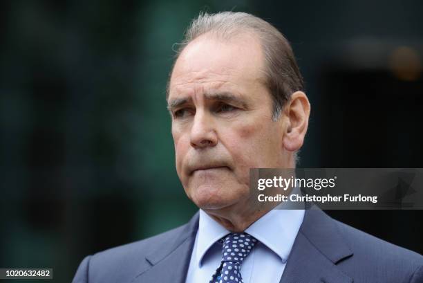 Sir Norman Bettison gives a statement after he was granted a stay of proceedings during a hearing at Preston Crown Court on August 21, 2018 in...