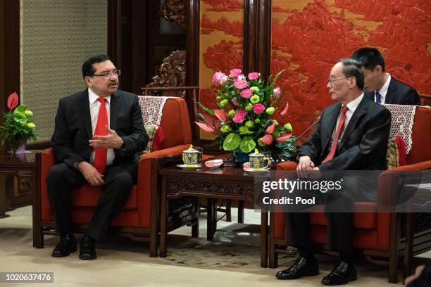 Chinese Vice President Wang Qishan and Medardo Gonzalez, a Salvadoran politician, Secretary General of the ruling party of El Salvador, during their...