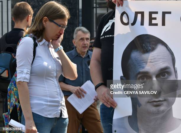 Ukrainian film-maker Oleg Sentsov's cousin Natalya Kaplan takes part in a rally in front of Russia embassy with an appeal to free Ukrainian film...