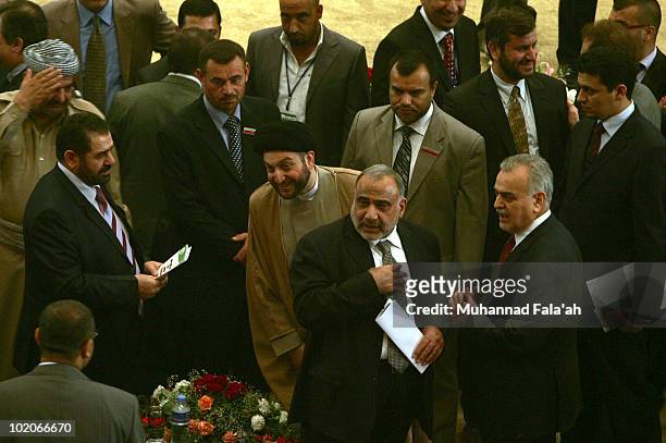 Iraqi officials and lawmakers are seen on June 14, 2010 during the first session of the Iraqi Parliament at the Green Zone in Baghdad, Iraq. The...