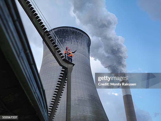 workers at coal fired power station - powerhouse stock pictures, royalty-free photos & images