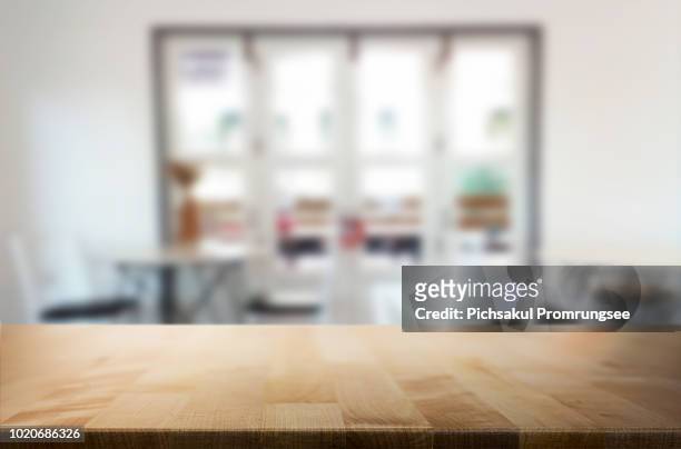 close-up of wooden table at home - focus on foreground stock pictures, royalty-free photos & images