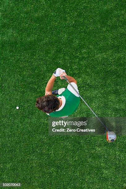 man playing golf - golfer stock pictures, royalty-free photos & images