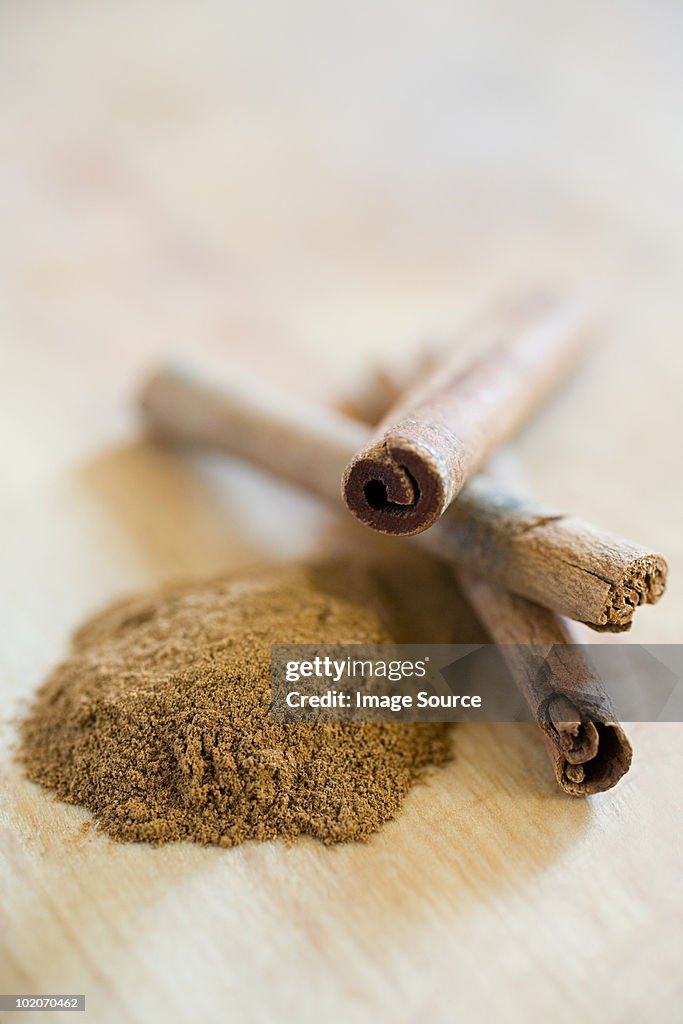 Ground cinnamon and cinnamon sticks