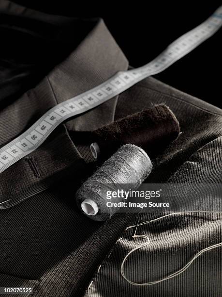 tailoring a jacket - tailored suit stock pictures, royalty-free photos & images