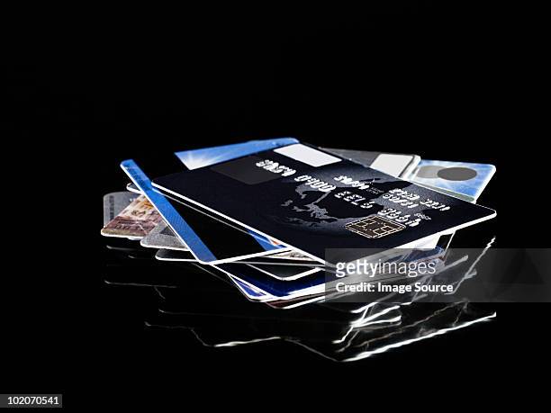 stack of credit cards - credit card and stapel stockfoto's en -beelden