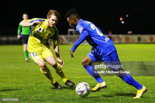 Elvis KAMSOBA of Avondale runs with the ball from Beau BLIZZARD of Devonport during the FFA Cup round of 16 match between Avondale FC and Devonport...