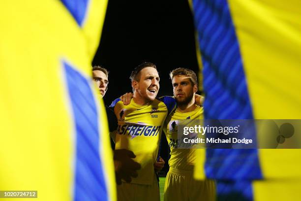 Brayden MANN of Devonport speaks to teammates during the FFA Cup round of 16 match between Avondale FC and Devonport Strikers at ABD Stadium on...