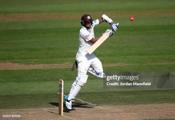 Jade Dernbach of Surrey hits out during day three of the Specsavers County Championship Division One match between Surrey and Lancashire at The Kia...