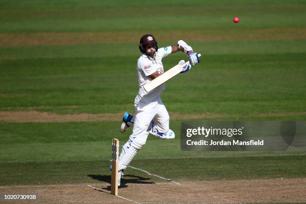 Jade Dernbach of Surrey hits out during day three of the Specsavers County Championship Division One match between Surrey and Lancashire at The Kia...