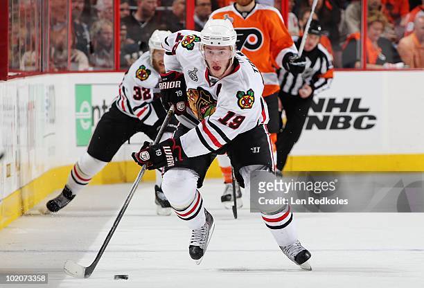 Jonathan Toews of the Chicago Blackhawks skates the puck across center ice against the Philadelphia Flyers in Game Six of the 2010 NHL Stanley Cup...