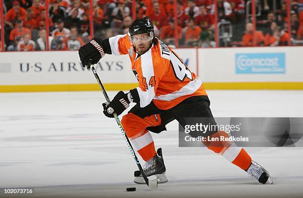 Kimmo Timonen of the Philadelphia Flyers skates with the puck against the Chicago Blackhawks in Game Six of the 2010 NHL Stanley Cup Final at the...