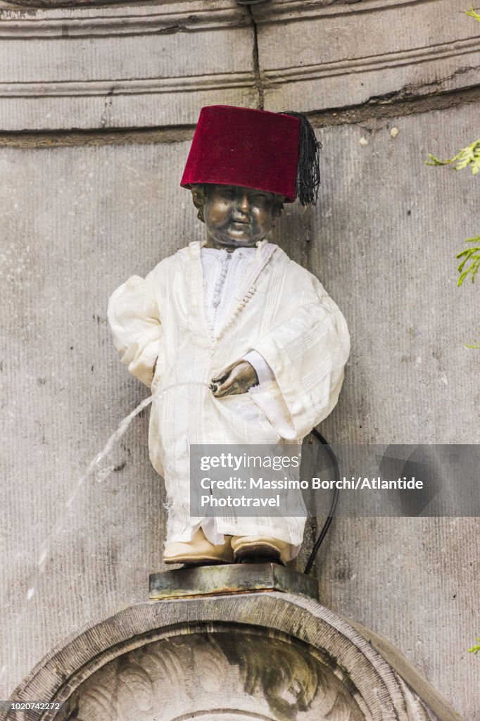 Manneken Pis statue, the symbol of Brussels, in Moroccan dress