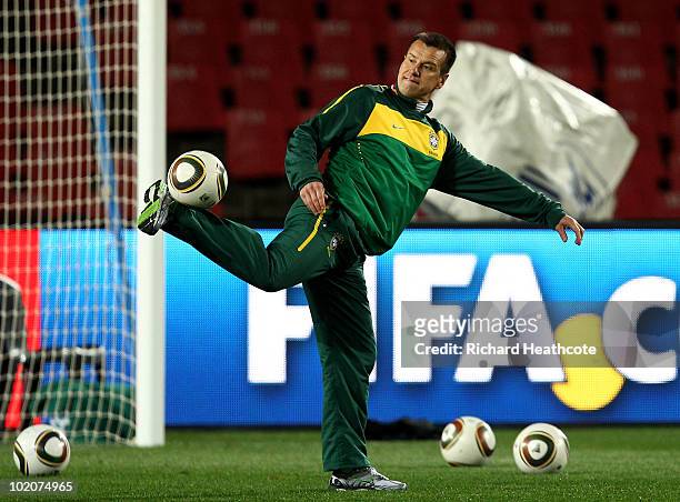 Head Coach, Dunga controls the ball during the Brazil training session at Ellis Park on June 14, 2010 in Johannesburg, South Africa. Brazil will play...