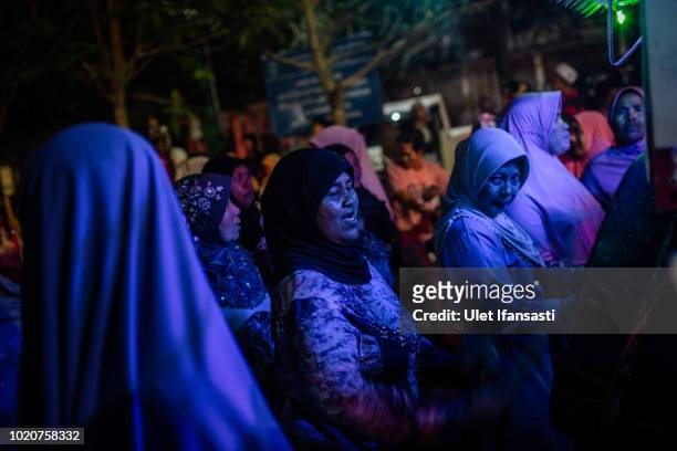 Indonesian Muslims parade on the streets as Muslims celebrate Eid Al-Adha in Mataram on August 21, 2018 in Lombok island, Indonesia. Thousands of...
