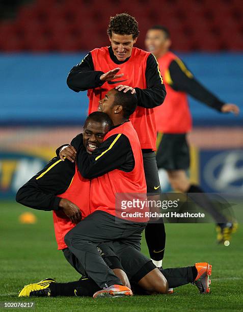 Grafite is congratulated by Robinho and Elano during the Brazil training session at Ellis Park on June 14, 2010 in Johannesburg, South Africa. Brazil...