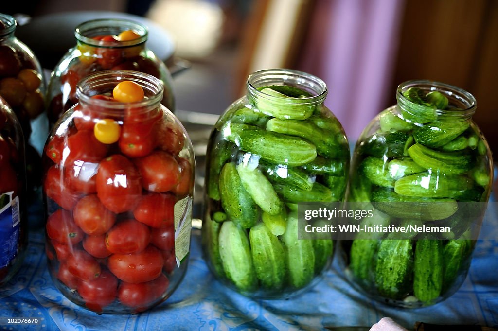Tomatos and cucumbers ready for preservation