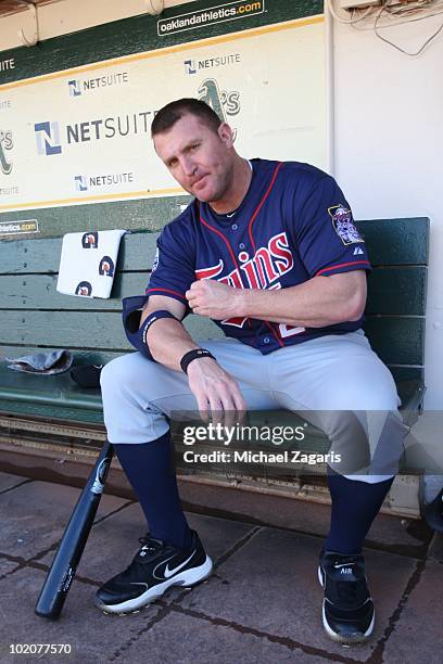 Jim Thome of the Minnesota Twins sitting in the dugout prior to the game against the Oakland Athletics at the Oakland Coliseum on June 5, 2010 in...