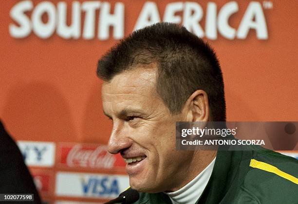 Brazil's coach Dunga smiles during a press conference after a team training session at Ellis Park stadium on June 14, 2010 a day before their 2010...