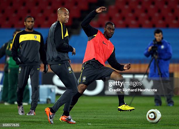 Grafite and Luisao in action during the Brazil training session at Ellis Park on June 14, 2010 in Johannesburg, South Africa. Brazil will play their...