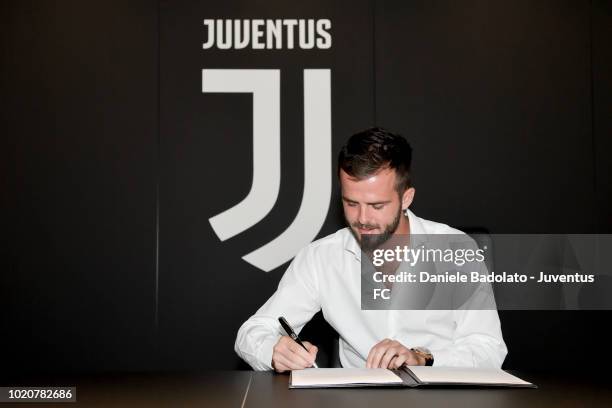 Miralem Pjanic Extends His Contract With Juventus on August 21, 2018 in Turin, Italy.