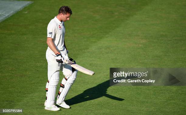 Jos Buttler of England leaves the field after being dismissed by Jasprit Bumrah of India during day four of the Specsavers 3rd Test match between...