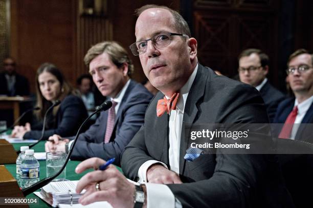 Christopher Ford, assistant secretary with the Bureau of International Security And Nonproliferation at the U.S. Department of State, right, speaks...
