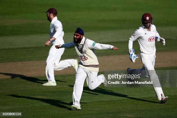 Amar Virdi of Surrey celebrates dismissing Alex Davies of Lancashire during day three of the Specsavers County Championship Division One match...