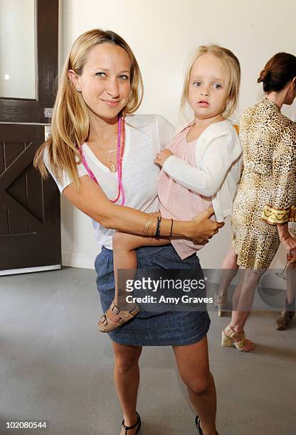 Jewelry designer Jennifer Meyer Maguire and daugher Ruby Maguire attend the Roseark Santa Monica Store Opening on June 12, 2010 in Santa Monica,...
