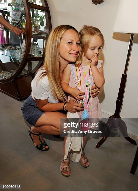 Jewelry designer Jennifer Meyer Maguire and daugher Ruby Maguire attend the Roseark Santa Monica Store Opening on June 12, 2010 in Santa Monica,...