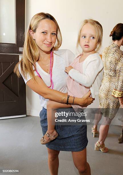 Jewelry designer Jennifer Meyer Maguire and daugher Ruby Maguire attend the Roseark Santa Monica Store Opening on June 12, 2010 in Santa Monica,...