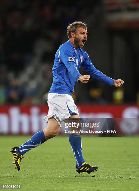 Daniele De Rossi of Italy celebrates scoring his team's first goal during the 2010 FIFA World Cup South Africa Group F match between Italy and...