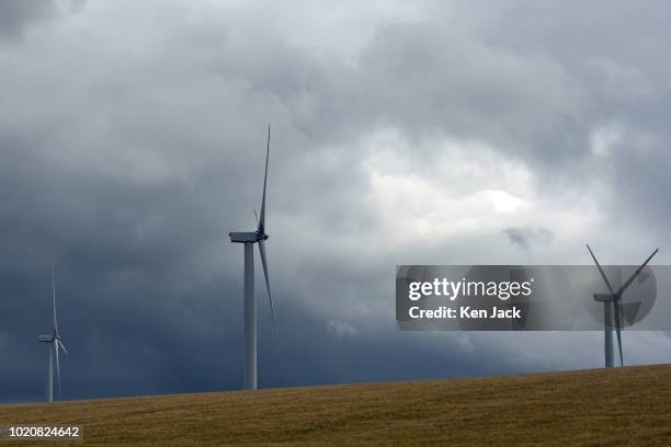 Wind turbines rise above a wheatfield in Fife as the SNP highlight claims Scotland "tops UK leaderboard" for renewable energy, on August 21, 2018 in...