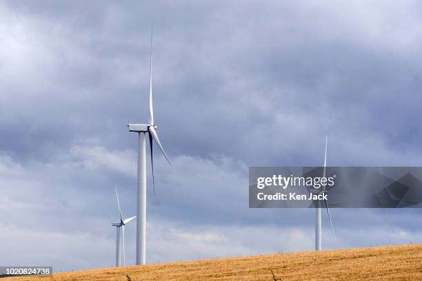 Wind turbines rise above a wheatfield in Fife as the SNP highlight claims Scotland "tops UK leaderboard" for renewable energy, on August 21, 2018 in...