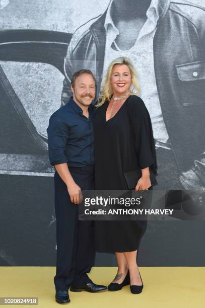 British actor Stephen Graham poses with British actress Hannah Walters on the red carpet at the UK premiere of Yardie, in central London on August...