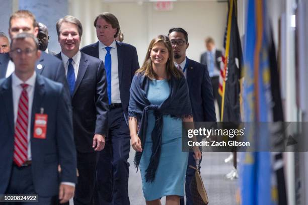 Supreme Court Nominee Brett Kavanaugh walks to a meeting with Sen. Claire McCaskill in her office on Capitol Hill on August 21, 2018 in Washington,...