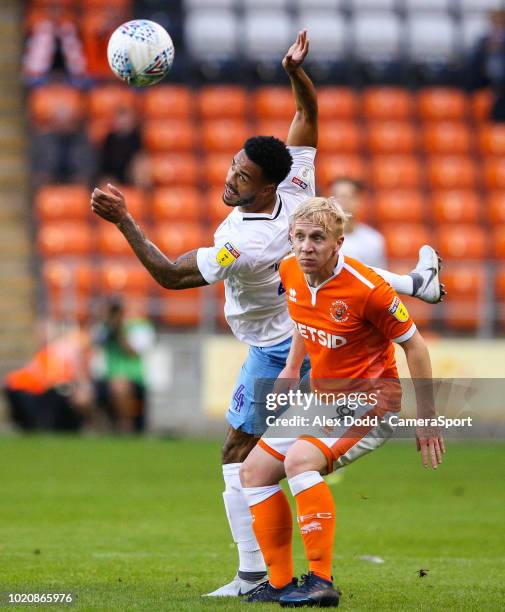 Blackpool's Mark Cullen vies for possession with Coventry City's Jordan Willis during the Sky Bet League One match between Blackpool and Coventry...